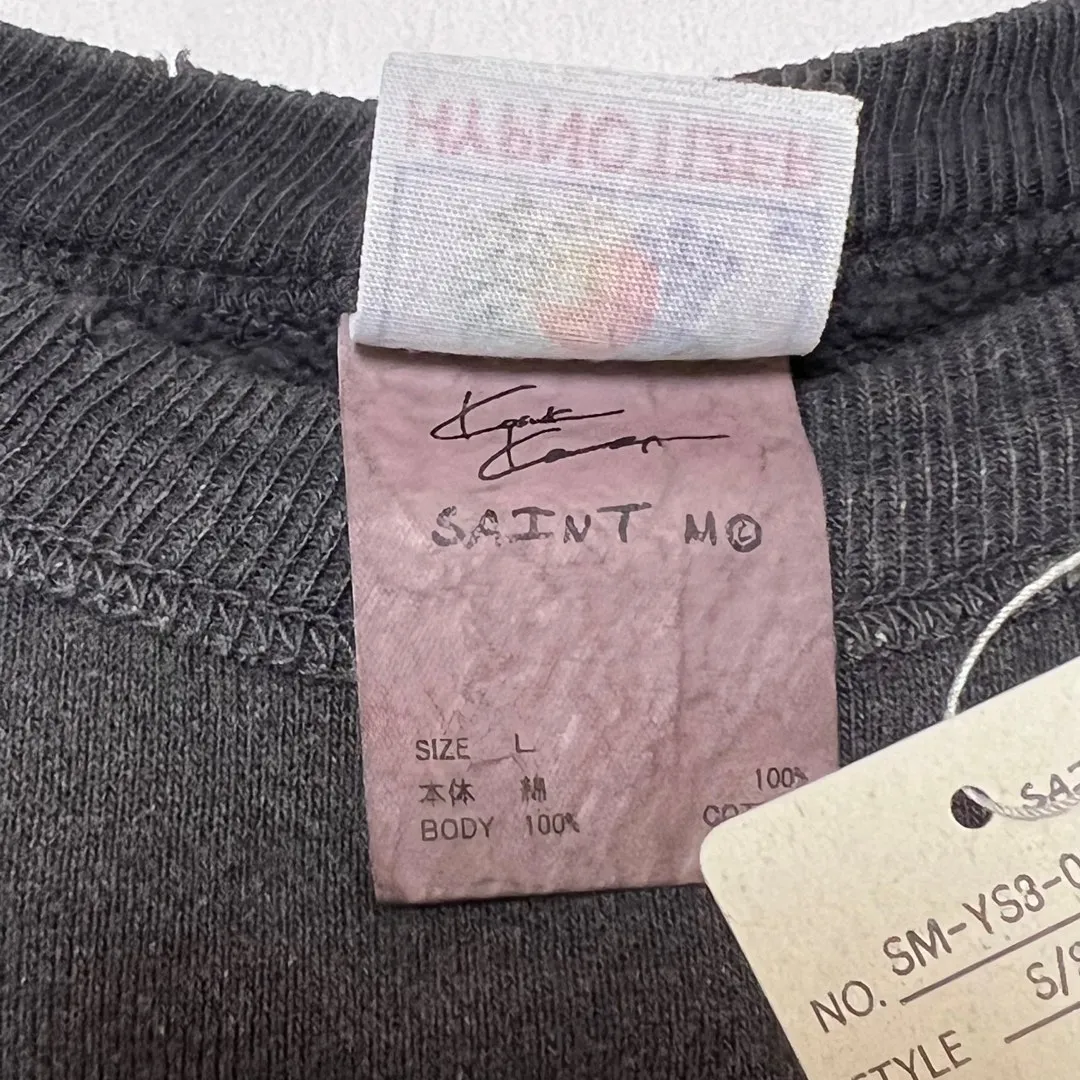 SAINT Mxxxxxx × Kosuke Kawamura KK_CRW SWT/NOTHNG IMP/BLK joint model Holy Infant Tadpole retro distressed sweatshirt, washed black S-XL Assute dyeing, genuine whole garment sprayed with horsetail fading process, collar/cuffs frayed in many places, front and rear panels/sleeves super complicated hanging grinding, heavy washing and distressing, correct fruit mark/angel mark